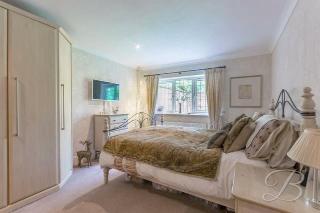 Let;s move on now to the first of the four bedrooms at the £485,000 barn conversion. The main three, including this one, are a good size and benefit from extensive, built-in wardrobe space.