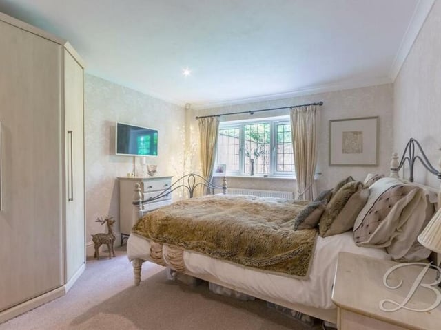Let;s move on now to the first of the four bedrooms at the £485,000 barn conversion. The main three, including this one, are a good size and benefit from extensive, built-in wardrobe space.