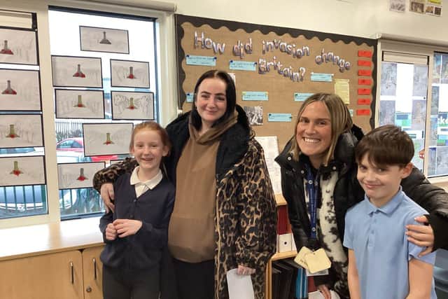 Year 4 families enjoying a visit to the school’s art exhibition