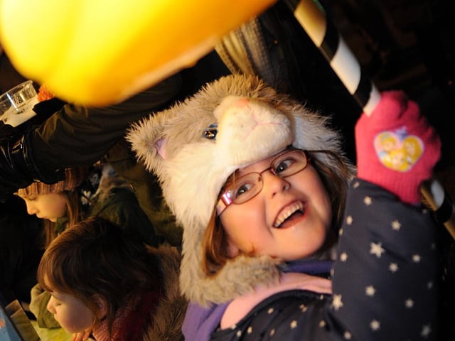 Mansfield Woodhouse firework event. Ruby Quincey bags herself a prize on the hook-a-duck stand in 2016