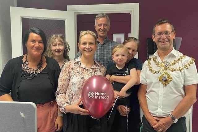 Suzie Leeson and Mansfield Mayor, Andy Abrahams, pose with family and staff at the launch of Mansfield Home Instead.