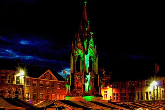 Mansfield's Bentinck Memorial was lit up in green to celebrate the district's success in the Green Flag Awards