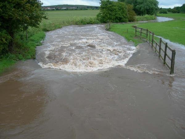 Even on Carr Lane, the river overflowed onto the grass verge and nearby fields. It was a close call for some residents down on the estate as water levels rose.