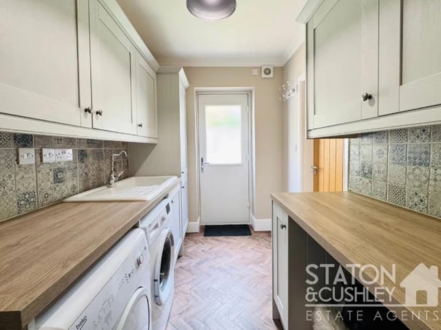The property benefits from a handy utility area which has space for a washing machine and dryer, side access to the garden.