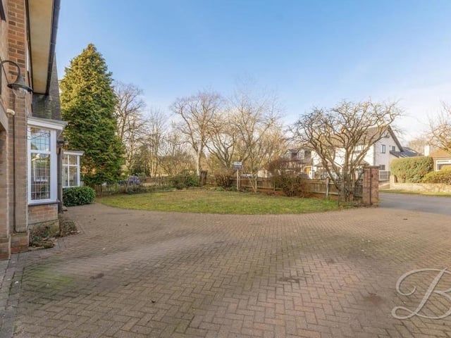 Also at the front is this block-paved driveway that provides off-street parking space for up to five cars. It leads also to a car port, large enough for a caravan.