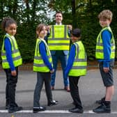Pupils at Heathlands Primary School with their hi-vis vests donated by Barratt and David Wilson Homes Sheffield