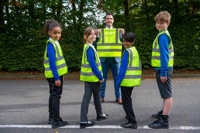 Pupils at Heathlands Primary School with their hi-vis vests donated by Barratt and David Wilson Homes Sheffield