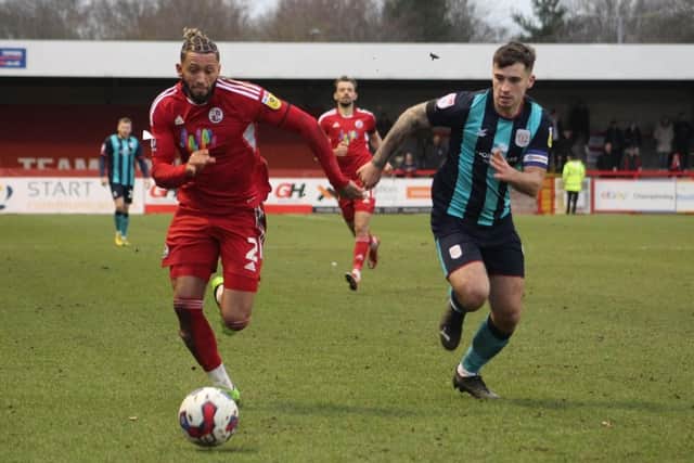 Kellan Gordon (right) in action for his current club, Crawley Town, earlier this year.