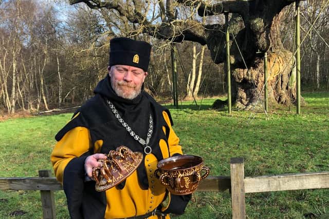 The Sheriff of Nottingham Richard Townsley pictured with the Wassailing bowl at the Major Oak
