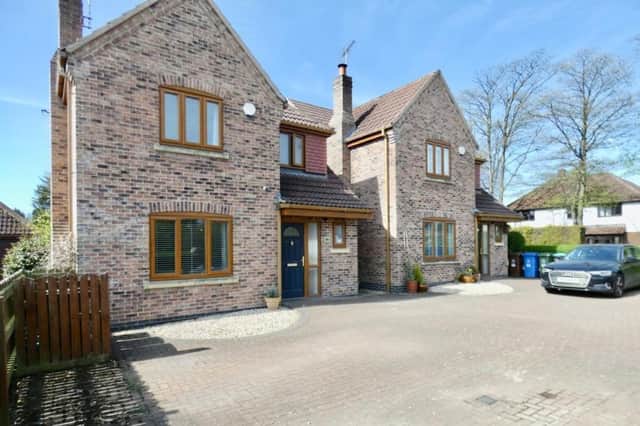 Offers of more than £380,000 are being invited by estate agents Strike for this unique, four-bedroom, detached house on Newlands Drive in Forest Town.