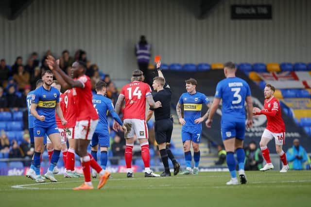 Jordan Bowery is dismissed during the Sky Bet League 2 match against AFC Wimbledon at Cherry Red Records Stadium, 27 Jan 2024 
Photo Chris & Jeanette Holloway / The Bigger Picture.media