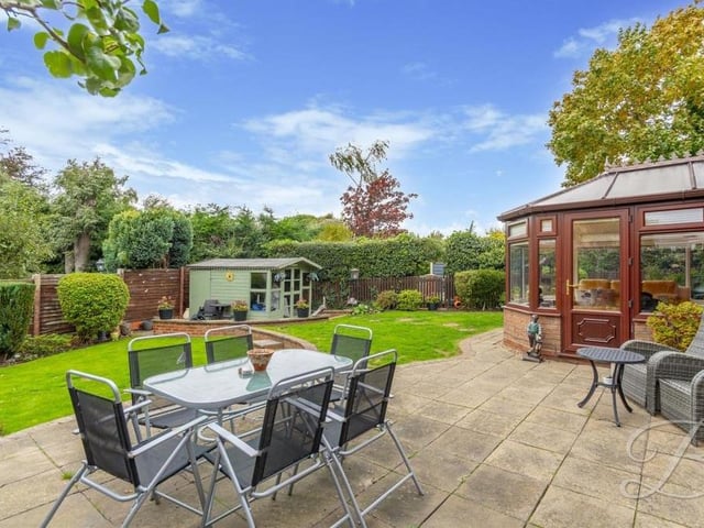 Lazy, enjoyable days in the summer sun are guaranteed on this pleasant patio, which can be accessed from the conservatory (right).