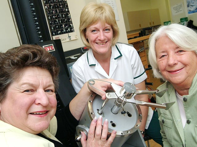 Senior occupational therapist Chery Flint, centre, shows King's Mill Hospital League of Friends trustee Barbara Glass, left, and fund raising committee chairman Pauline Platt, the new piece of hand exercising equipment which was handed over in 2007.