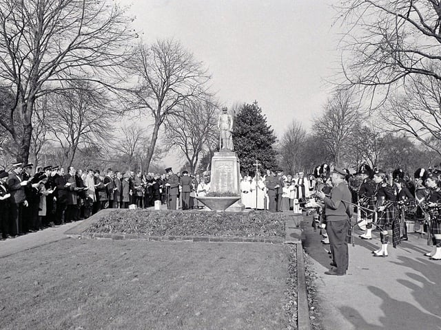 A ceremony paying tribute to the area's war dead takes place in Sutton in 1981.