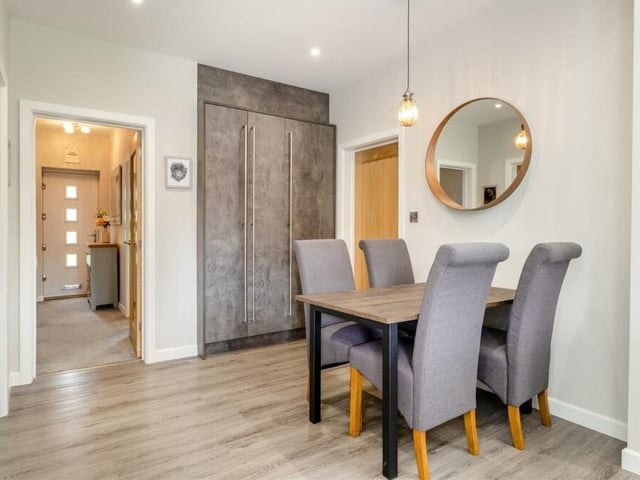 Here is the delightful dining area of the open-plan kitchen. In the background, you can also see the entrance hallway of the £395,000 bungalow.