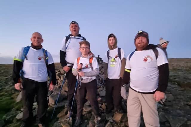 A photo shared from the peaks. Pictured, Craig Scutt and his team.