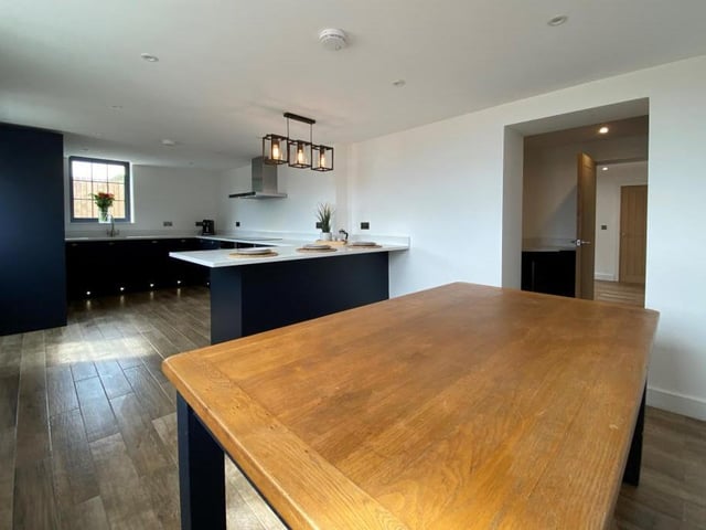 The dining kitchen is the first room to look at. It boasts a host of integrated appliances, including double oven, electric hob, extractor fan and dishwasher.