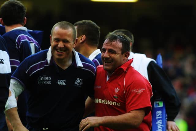 Scotland props Matt Stewart and George Graham (wearing a Wales Jersey) celebrate Scotland's 27-22 victory in Cardiff in 2002. It was the national side's last win on Welsh soil. Picture: Mike Finn Kelcey/Getty Images