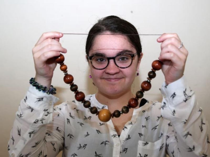 Hannah Spindler found this necklace to try on during a fundraiser for Brinsley Animal Rescue.