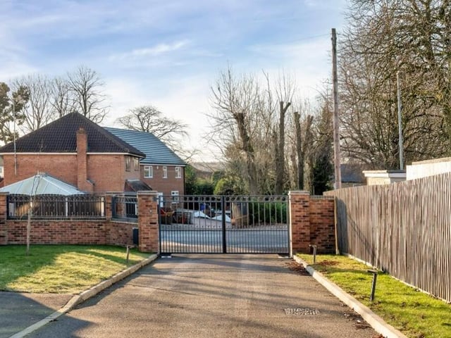 The property is one of two in an exclusive, gated development, off Forest Road. A driveway provides plenty of space for off-street parking.
