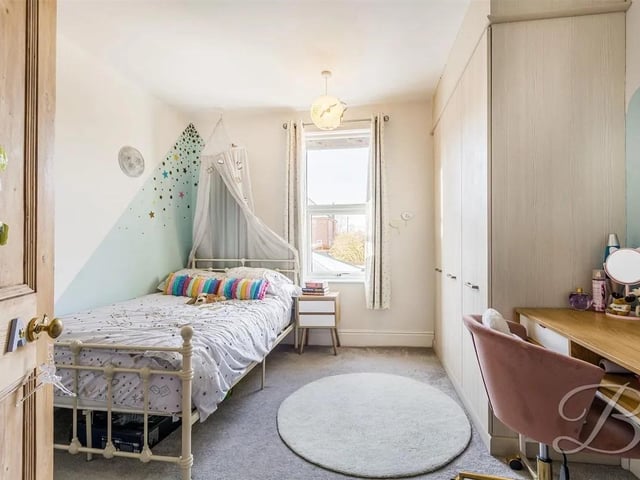 The first floor offers three well-proportioned bedrooms, perfect for a growing family.
