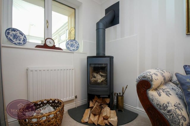 In one corner of the lounge at the £450,000-plus property is this attractive log-burning stove.