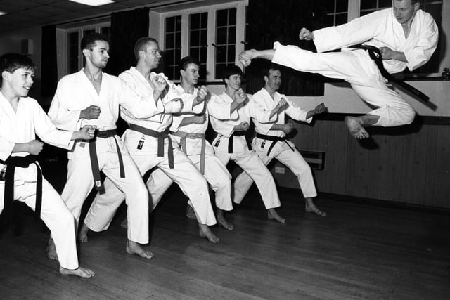 John Herring from Lovedean Karate club flying towars the rest of the group in 1991. The News PP4880
