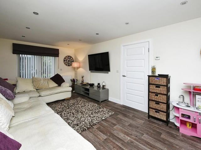 It wouldn't be hard to spend a relaxing night in, thanks to this living room.