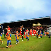 Mansfield Town Football Club, or 'The Stags', are currently in League Two, while Chesterfield's football club are in The National League, the league below.