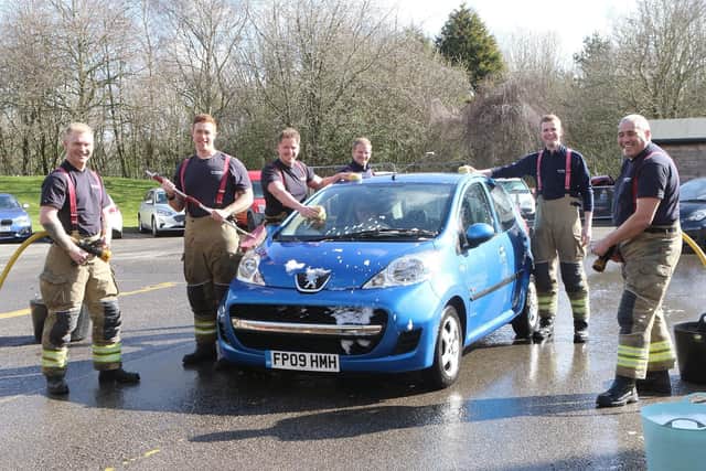 Firefighters from Ashfield Fire Station held a charity car wash for Ukraine and the firefighters charity 