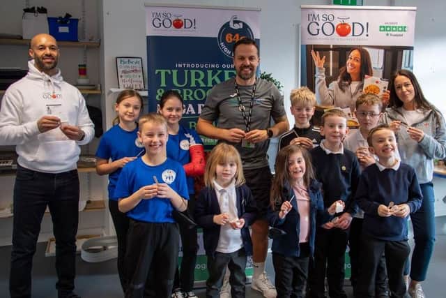 Adults pictured are Luke Skidmore (co- founder of I’m So Good), Scott Hardy (Director of Next Level Sports Ltd), and Emily Willis (co-founder of I’m So Good) with children at Leamington Primary & Nursery Academy.