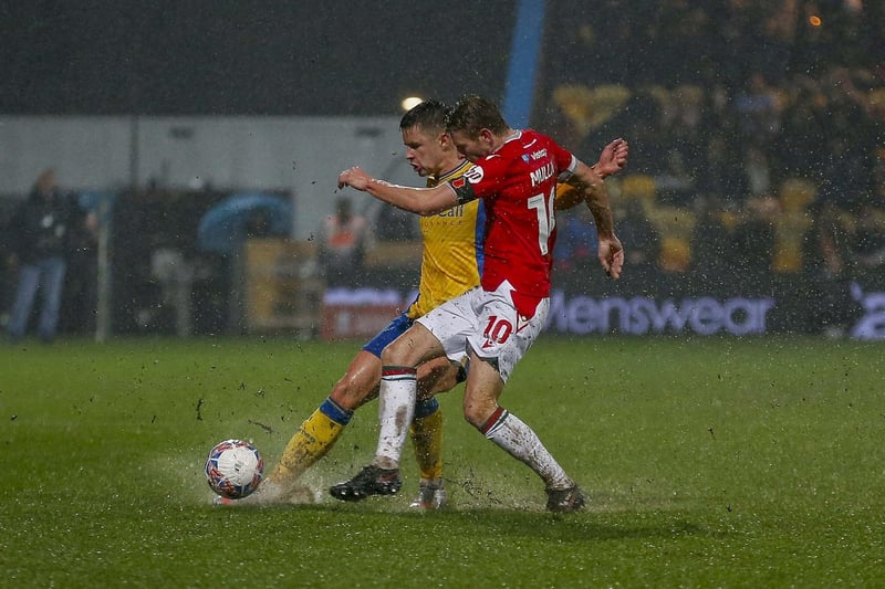 Callum Johnson battles his opponent and the weather during Stags' FA Cup first round exit against Wrexham in November.
