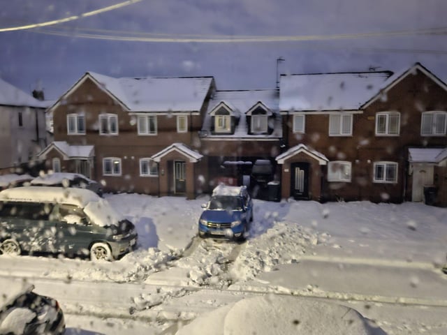 A snow-covered street in Sutton.