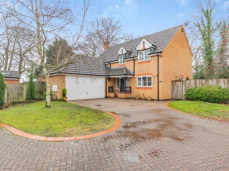 As we say farewell to the £450,000 Forest Town house, let's have one last look at the impressive frontage. A private, block-paved driveway provides off-street parking space and leads to a sturdy double garage.