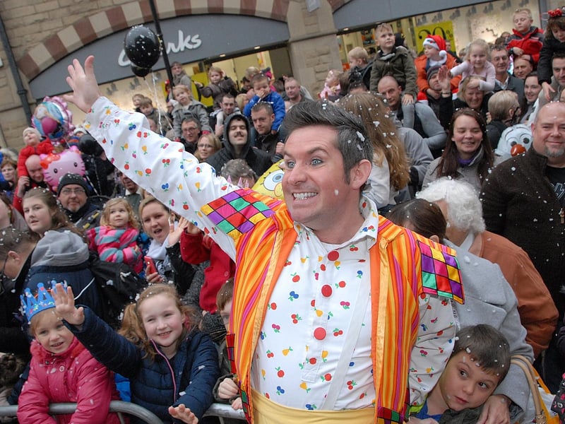 Panto star Silly Billy,(Adam Moss) meets the crowds at the Christmas lights switch-on in 2014.