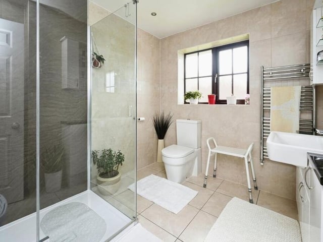 The first floor of the property also houses the well-designed family bathroom, which includes a shower enclosure, hand wash basin, towel-rail and WC.