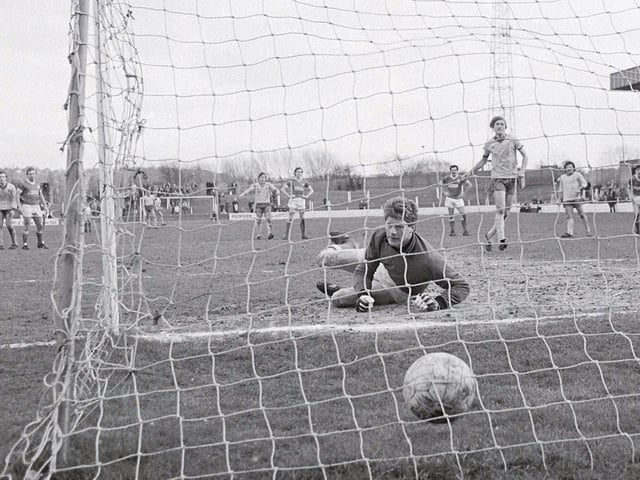 John Dungworth slots home the winning penalty at home to Swindon Town.