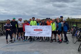 The cyclists gather on Benneley Viaduct at the end of their epic journey. Photo: Submitted