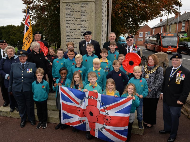 A past launch of the Royal British Legion poppy appeal at Kirkby War Memorial. Pictured are children from Kingsway Primary School and Coun Glenys Maxwell helped with the launch.