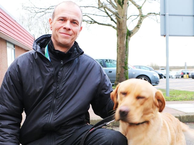 PC Dean Allen with tracker dog Niko