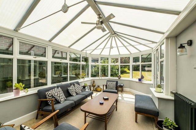 The conservatory at the Ravenshead property is a terrific place to sit and enjoy the views over the garden. It boasts underfloor heating and column radiators.