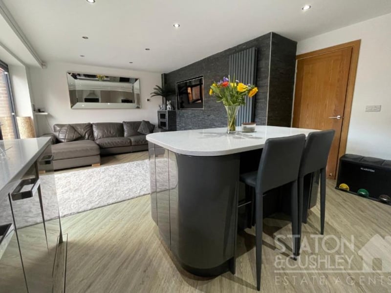 A final shot of the open-plan kitchen/diner, underlining its modern appearance. Other assets include spotlights, LVT flooring and contemporary, vertical radiators.