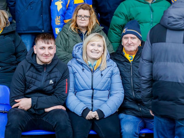 Mansfield Town fans enjoy the win at Stockport County