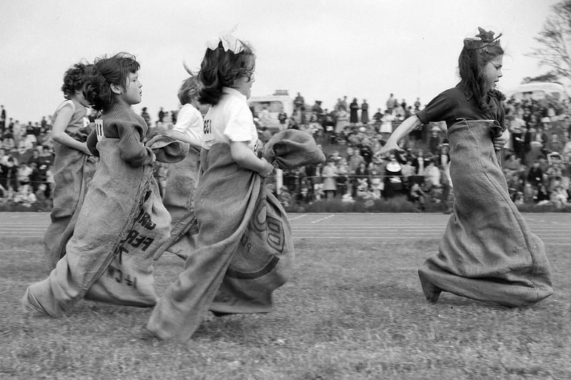 Youngsters take part in a traditional sack race at Berry Hill in 1963.