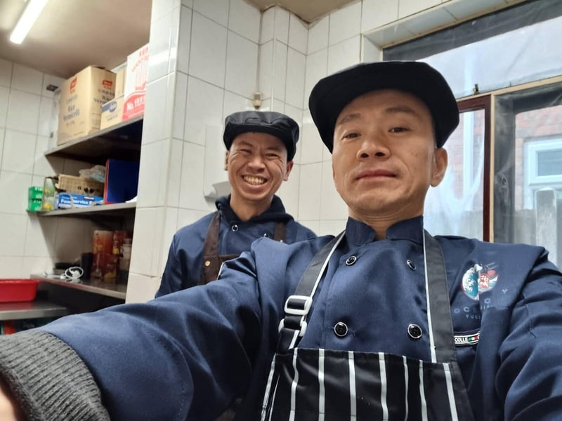Big smiles from the kitchen.