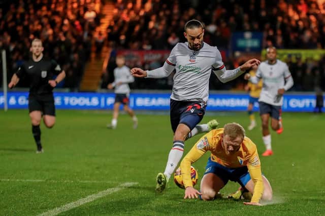 Mansfield Town defender Frazer Blake-Tracy(22) during the Sky Bet League One match against Bolton Wanderers FC at the One Call Stadium, 01 Jan 2025, Photo credit Chris & Jeanette Holloway / The Bigger Picture.media