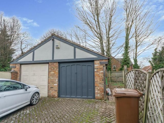 This sizeable garage comes in handy. It contains ample space for storage.