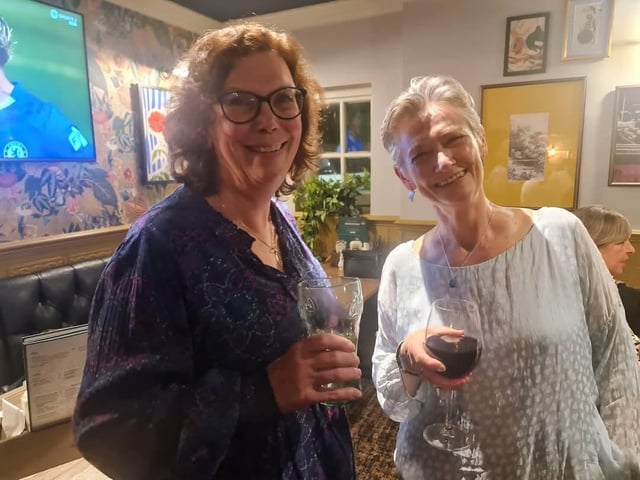 Jane Shooter (nee Gilboy) and Dot Hallam enjoying a catch up and a drink at the school reunion