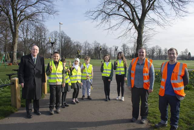 Hucknall councillors John Wilmott (left) and Lee Waters join Coun Samantha Deakin and volunteers for a litter pick in Hucknall's Broomhill Park