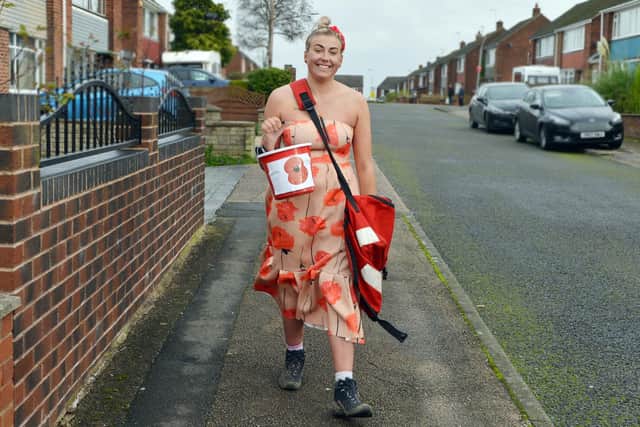 Post lady Katy Haydon doing her round in a poppy dress. Picture: Brian Eyre